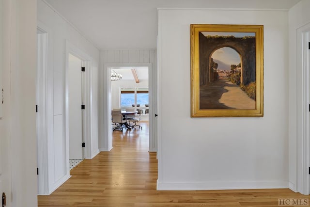 corridor with light wood-type flooring