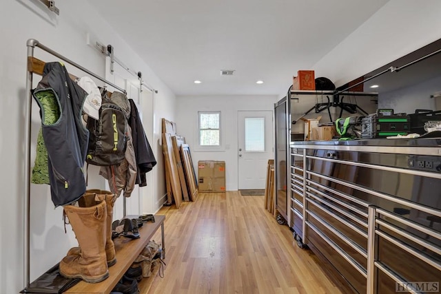 mudroom with light wood-type flooring