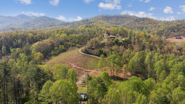 380 Ledford Dr, Franklin, NC 28734 - back of property featuring a chimney, a balcony, and a mountain view