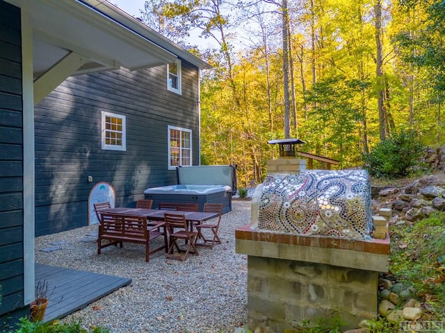 view of patio / terrace featuring a hot tub