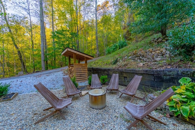 view of patio with a fire pit