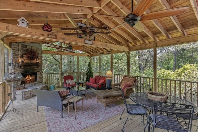 70 Rolling Acres Dr, Highlands, NC 28741 - sunroom with an outdoor living space with a fireplace, a ceiling fan, and outdoor dining space