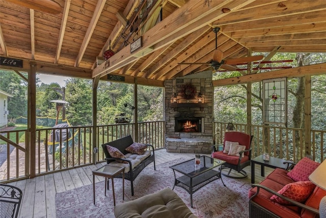 70 Rolling Acres Dr, Highlands, NC 28741 - sunroom with a ceiling fan and an outdoor living space with a fireplace