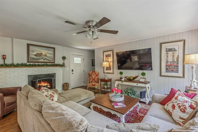 70 Rolling Acres Dr, Highlands, NC 28741 - living area featuring a brick fireplace, ceiling fan, and wood finished floors