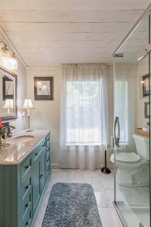 70 Rolling Acres Dr, Highlands, NC 28741 - bathroom featuring toilet, vanity, wood ceiling, and marble finish floors