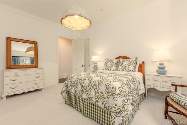 bedroom featuring ornamental molding and light carpet