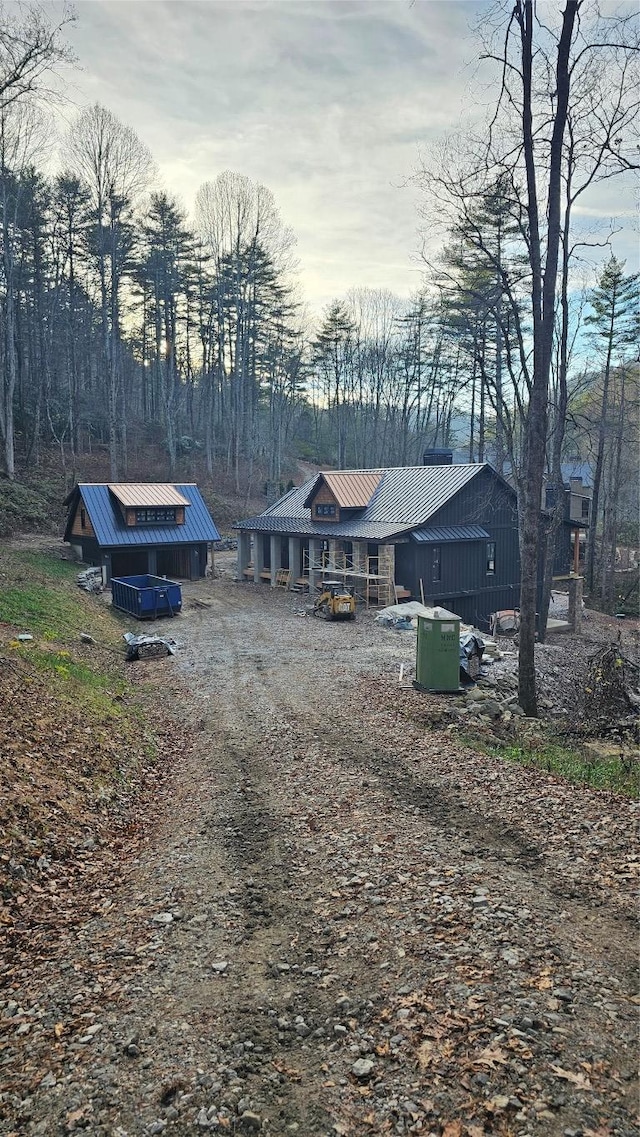 exterior space with metal roof