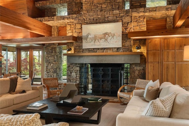 749 Stillmont Cir, Cashiers, NC 28717 - living room with a healthy amount of sunlight, wood walls, a fireplace, and a towering ceiling