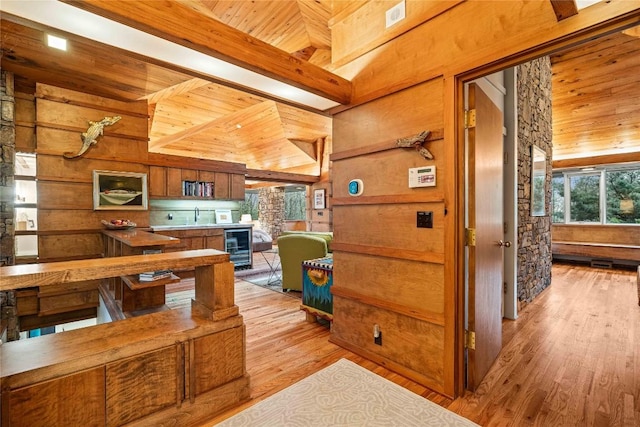 749 Stillmont Cir, Cashiers, NC 28717 - kitchen featuring wood walls, wine cooler, vaulted ceiling, light wood finished floors, and wood ceiling