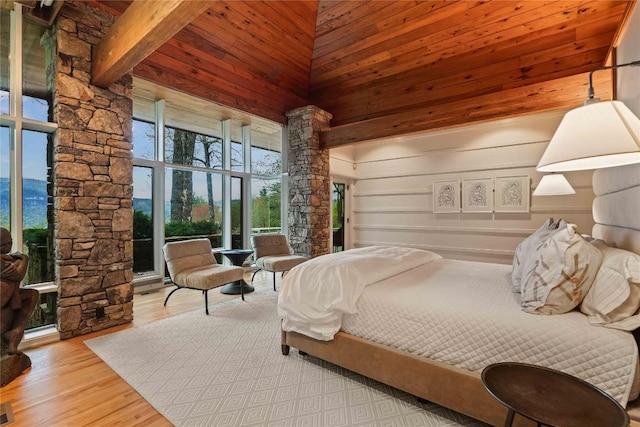 749 Stillmont Cir, Cashiers, NC 28717 - bedroom featuring a towering ceiling, ornate columns, visible vents, and wood finished floors