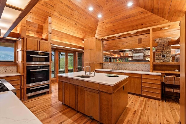 749 Stillmont Cir, Cashiers, NC 28717 - kitchen with a sink, a warming drawer, wood ceiling, and light countertops