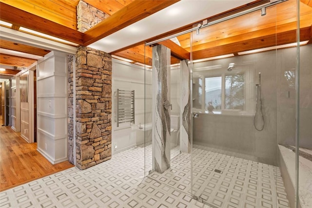 749 Stillmont Cir, Cashiers, NC 28717 - bathroom featuring tile patterned floors, a shower stall, and decorative columns