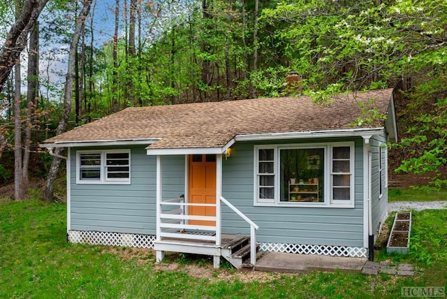 view of outdoor structure featuring a yard