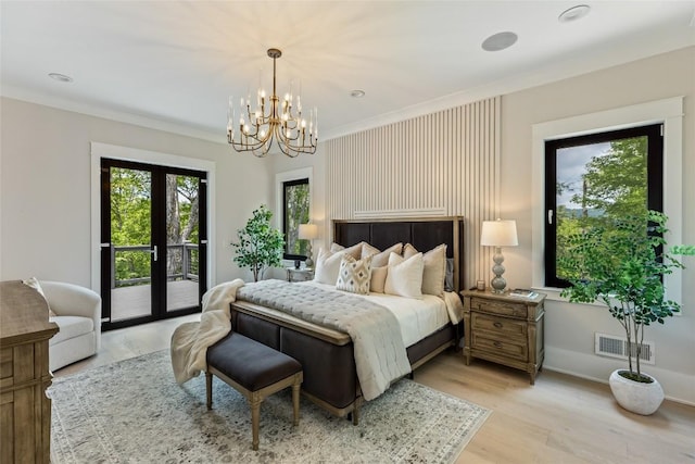 227 Sherwood Forest Rd, Highlands, NC 28741 - bedroom featuring access to exterior, a chandelier, light wood-type flooring, ornamental molding, and french doors