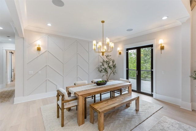 227 Sherwood Forest Rd, Highlands, NC 28741 - dining space with a decorative wall, a chandelier, light wood-type flooring, baseboards, and ornamental molding