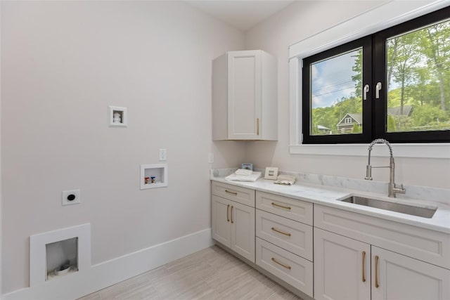 227 Sherwood Forest Rd, Highlands, NC 28741 - laundry room with electric dryer hookup, washer hookup, baseboards, and cabinet space