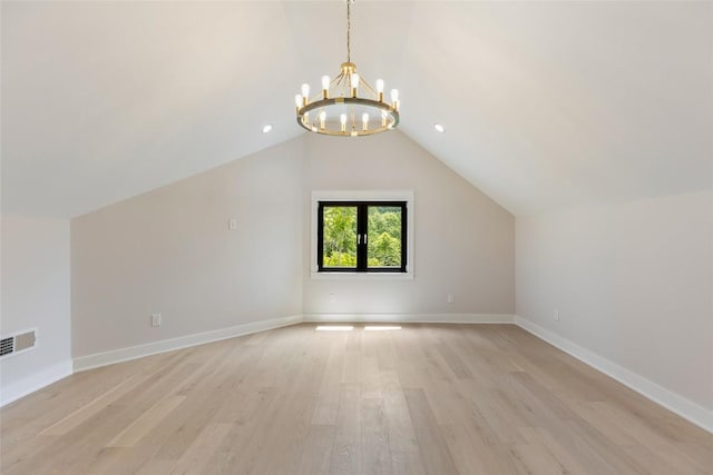227 Sherwood Forest Rd, Highlands, NC 28741 - bonus room with a chandelier, vaulted ceiling, light wood-type flooring, and baseboards