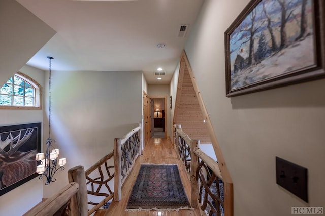 hallway featuring light hardwood / wood-style flooring