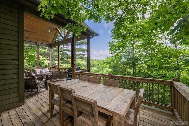 deck featuring outdoor lounge area