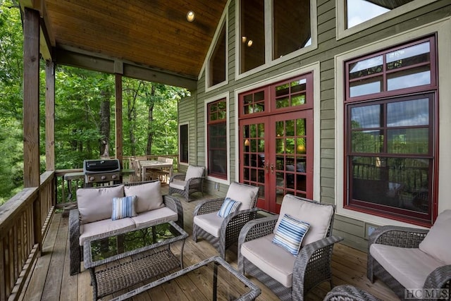 view of patio with area for grilling, an outdoor hangout area, and french doors