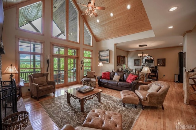 living room with wooden ceiling, light hardwood / wood-style floors, high vaulted ceiling, and a notable chandelier