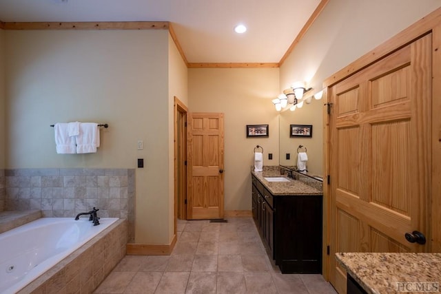 bathroom with ornamental molding, a relaxing tiled tub, tile patterned floors, and vanity