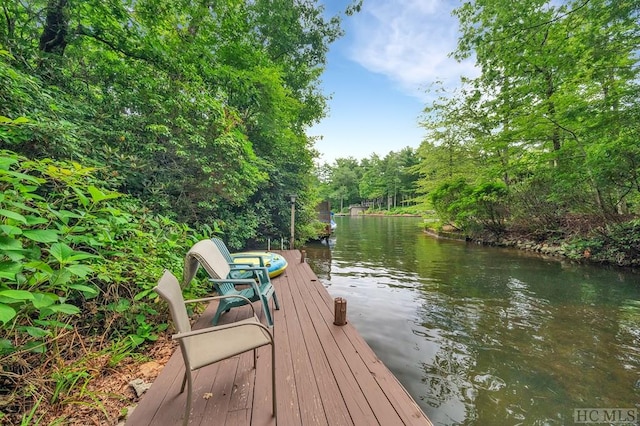 view of dock with a water view