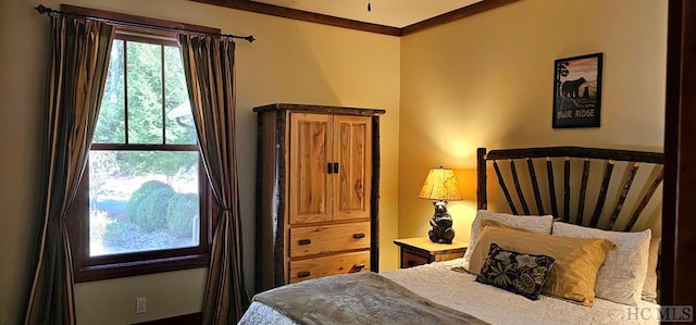 bedroom with crown molding