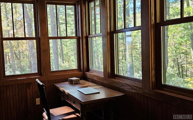 unfurnished sunroom with a healthy amount of sunlight