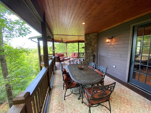 view of patio featuring ceiling fan