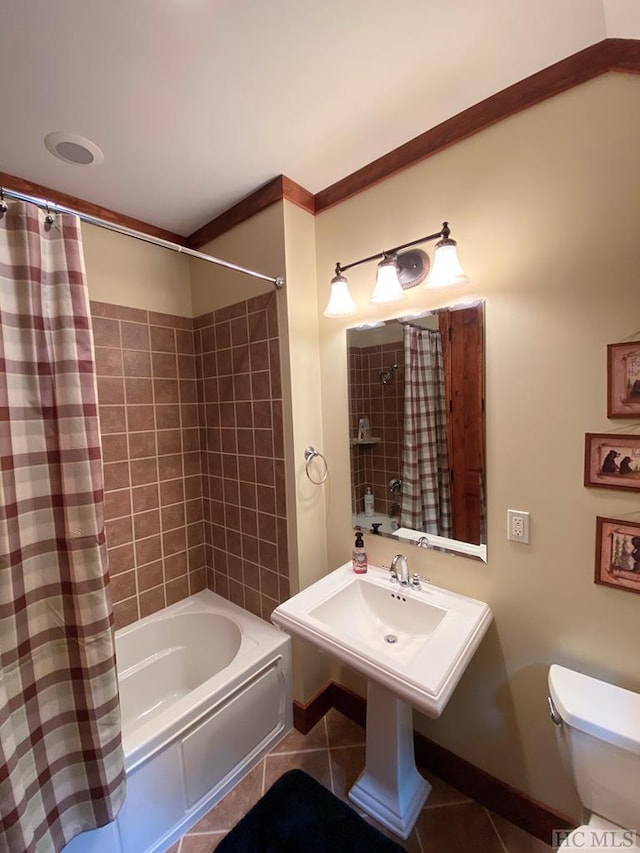 bathroom with tile patterned flooring, shower / bathtub combination with curtain, and toilet