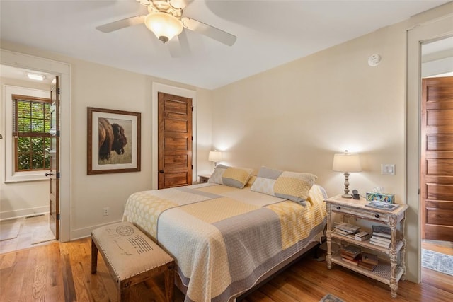 50 Bluestar Way, Glenville, NC 28736 - bedroom with wood finished floors and a ceiling fan