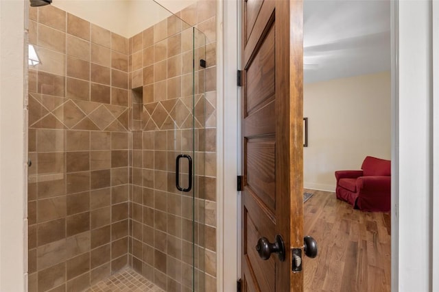 50 Bluestar Way, Glenville, NC 28736 - bathroom with a shower stall and wood finished floors
