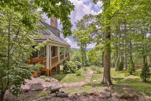 50 Bluestar Way, Glenville, NC 28736 - view of yard featuring a wooden deck and a sunroom