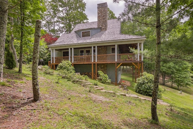 50 Bluestar Way, Glenville, NC 28736 - view of front of property featuring a chimney and a wooden deck
