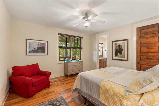 50 Bluestar Way, Glenville, NC 28736 - bedroom featuring wood finished floors and connected bathroom