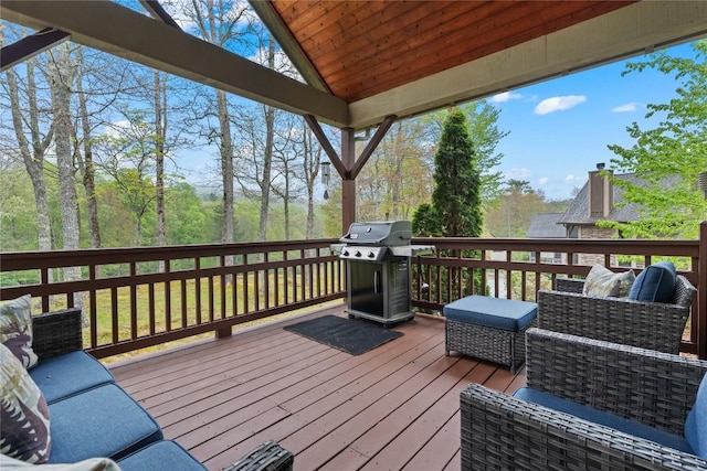 deck featuring a grill