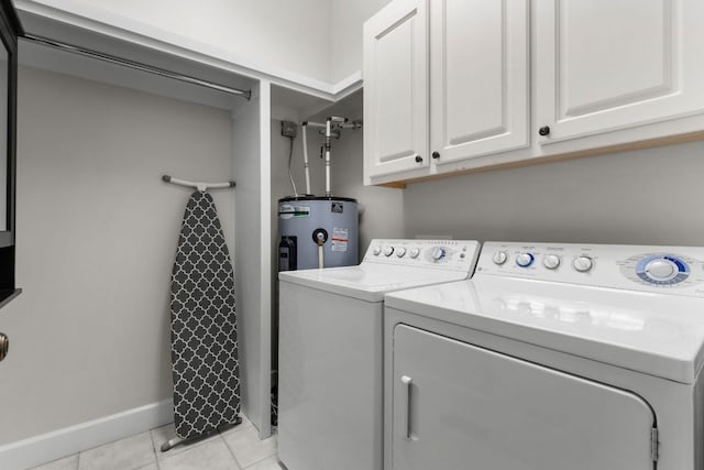 410C Highlands Cove Dr Unit 1300C, Highlands, NC 28741 - washroom featuring washing machine and clothes dryer, electric water heater, and light tile patterned flooring