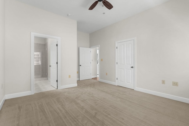 410C Highlands Cove Dr Unit 1300C, Highlands, NC 28741 - unfurnished bedroom with carpet floors, ensuite bath, and a ceiling fan