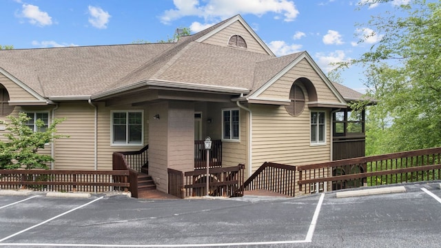 410C Highlands Cove Dr Unit 1300C, Highlands, NC 28741 - view of front facade featuring uncovered parking and roof with shingles