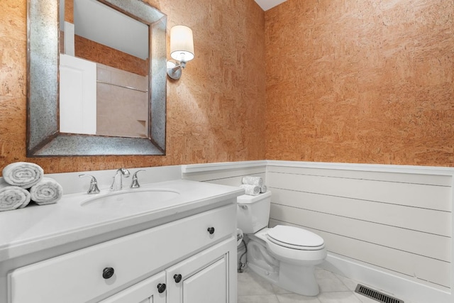 410C Highlands Cove Dr Unit 1300C, Highlands, NC 28741 - bathroom featuring vanity, tile patterned floors, and a wainscoted wall