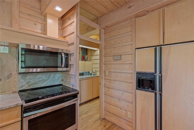 49 Hickory Ln, Highlands, NC 28741 - kitchen featuring appliances with stainless steel finishes, light brown cabinets, and light wood-style flooring