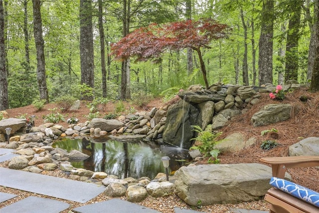 49 Hickory Ln, Highlands, NC 28741 - view of yard with a small pond and a wooded view
