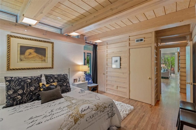 49 Hickory Ln, Highlands, NC 28741 - bedroom with a wooden ceiling with exposed beams and light wood-type flooring