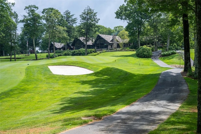 49 Hickory Ln, Highlands, NC 28741 - view of home's community featuring a lawn, view of golf course, and view of wooded area