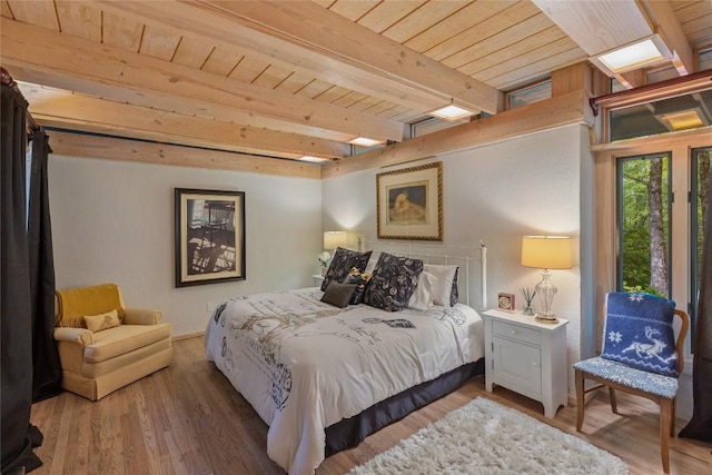 49 Hickory Ln, Highlands, NC 28741 - bedroom with a wooden ceiling with exposed beams and light wood-type flooring