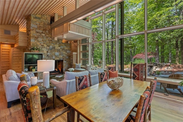 49 Hickory Ln, Highlands, NC 28741 - dining area featuring high vaulted ceiling, a fireplace, wood finished floors, and wood ceiling