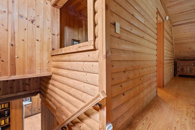130 Sarah Cove Rd, Otto, NC 28763 - stairway featuring log walls, wood finished floors, and wooden ceiling