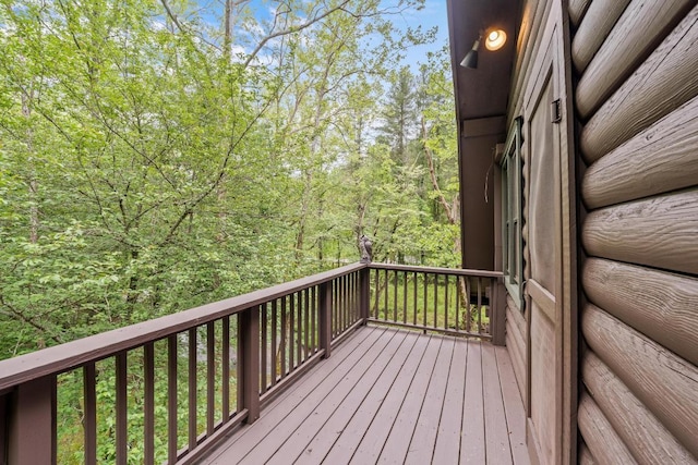 130 Sarah Cove Rd, Otto, NC 28763 - wooden deck featuring a wooded view