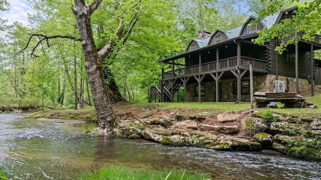 130 Sarah Cove Rd, Otto, NC 28763 - back of property featuring stairway, a wooden deck, a gambrel roof, stone siding, and log exterior